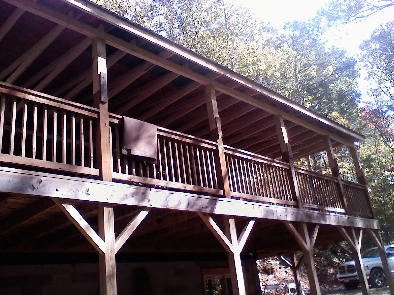 Timber framing under a new elevated porch and deck — Roof Leak Repair in Radcliffe by Roofing Brothers